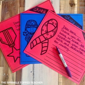 Easy Veterans Day activities: Red and blue writing paper with a note to a hero