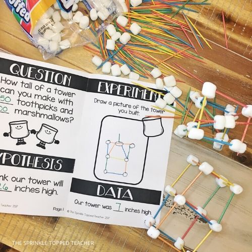 STEM activity booklet with the scientific method. Marshmallows and toothpicks laying on table with cube structures.