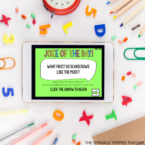 ipad with toys surrounding it and screen with joke of the day from the spiral review math warm ups