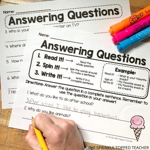 Restate the question activity with markers and student hand