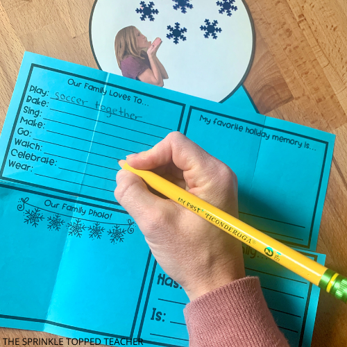 easy parents gift from students shown with student working on snow globe project for the holidays