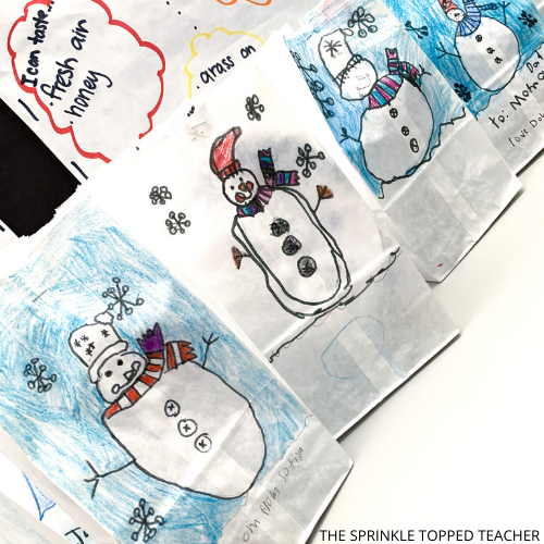 white paper bags with snowmen shown as an easy way for kids to wrap gifts