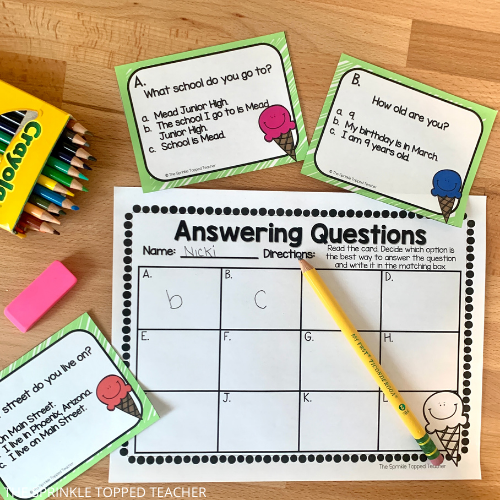 answering questions in a complete sentence practice activity with scoot cards