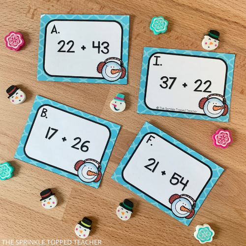2 digit addition with regrouping task cards for 2nd grade with snowman theme