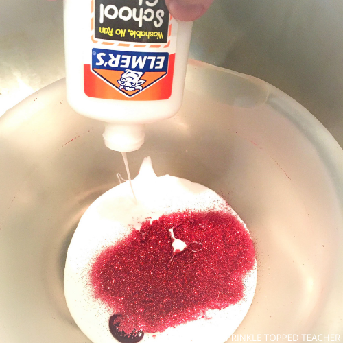 glue and glitter getting mixed to make a Valentine's Day slime recipe