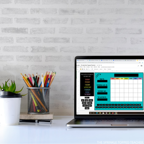 Computer on a desk with pencils. Computer screen open to Google Slides calendar for the classroom 