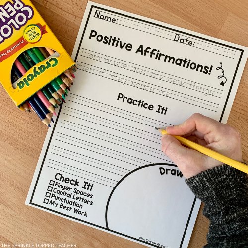 Free handwriting printable worksheets  student writing a positive affirmation with colored pencils out