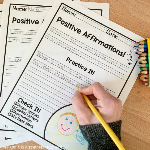 Positive affirmations for kids handwriting worksheet. Students practicing writing "when I fail, I can smile and try new strategies"