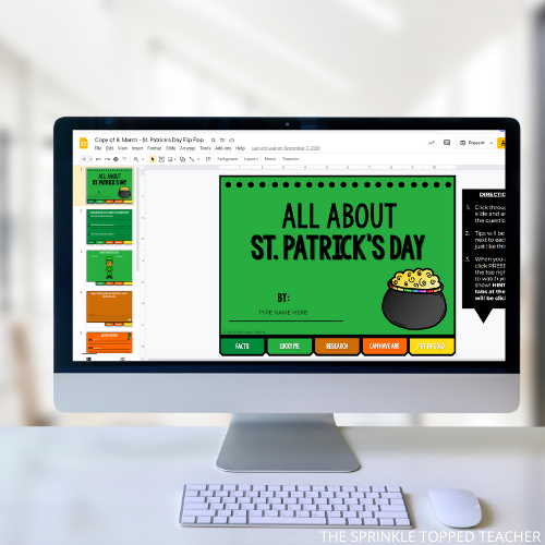Computer screen displaying digital St. Patrick's Day activity with pot of gold. Computer says "All About St. Patrick's Day"