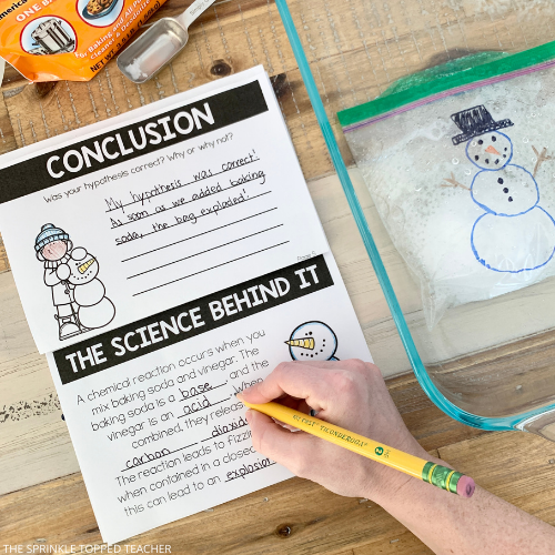 Student working on the scientific method notebook for their exploding snowman science experiment