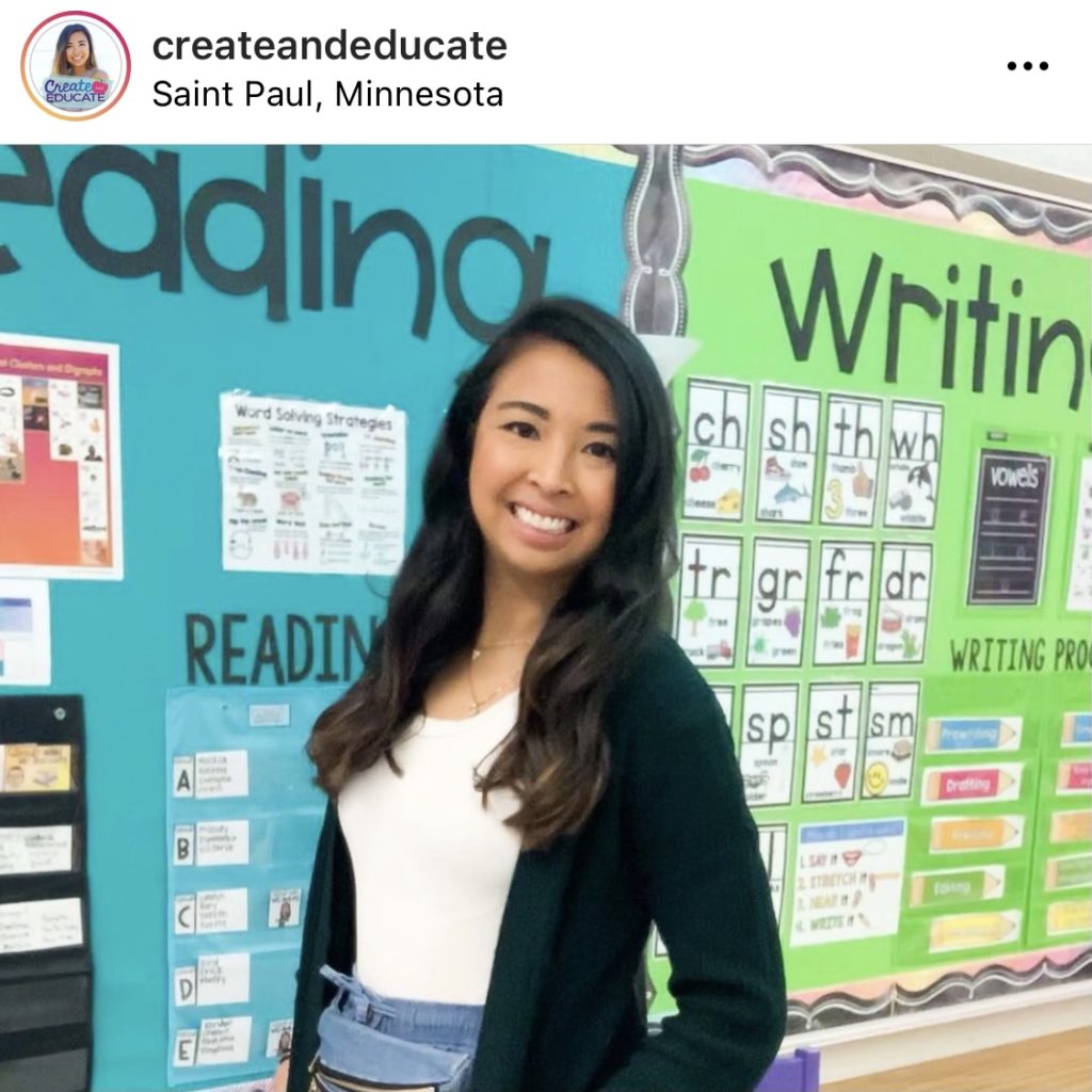 Teacher standing in front of reading and writing bulletin boards. @createandeducate