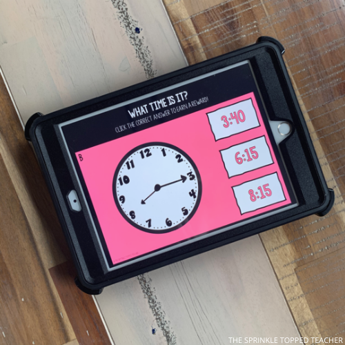 student ipad with pink screen showing a question with a clock. part of the first grade math warm up