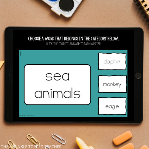 First grade morning warm up on the Ipad. Students are identifying which animals are sea animals