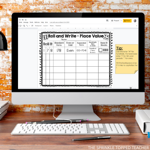 Computer screen with digital place value dice game. Includes standard form, expanded form, even and odd, base 10 blocks, and hundreds tens ones