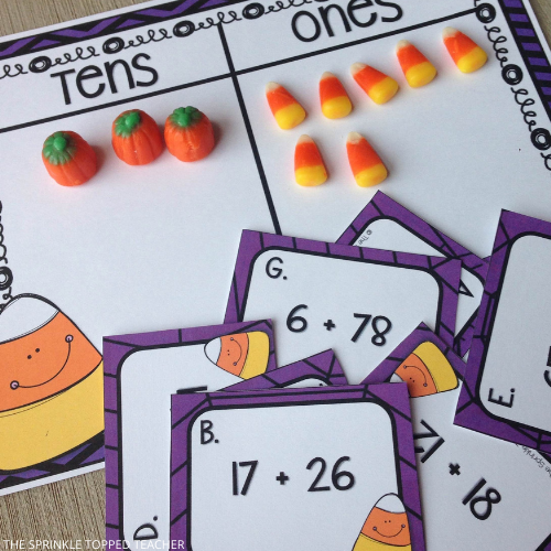 Count it up candy corn game, one of the fall activities for 2nd grade, laminated and ready to play with actual candy corn pieces. Number shown with candy corn is 37.