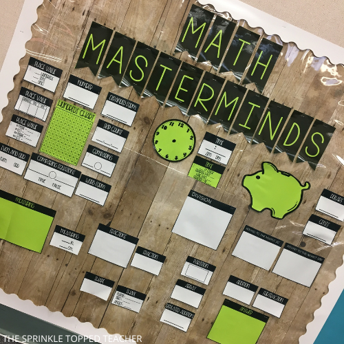 Math Masterminds bulletin board displaying the 2nd Grade Math Warm Up and all its elements. Includes time, piggy bank, money, measurement, numbers charts, comparing and more.