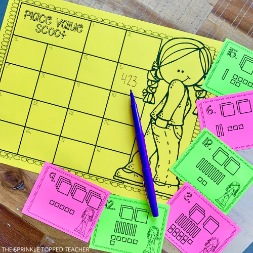 Use these place value activities to help students with their math skills. Here students are practicing hundreds, tens and ones.