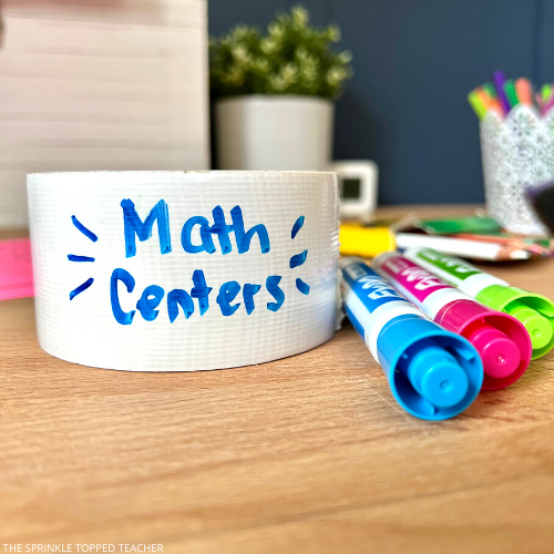 Amazon classroom favorites dry erase tape with white board markers on teacher's desk